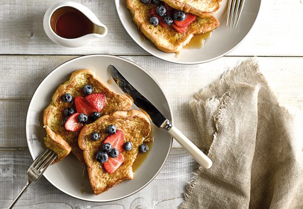 brioche French toast with berries and maple syrup