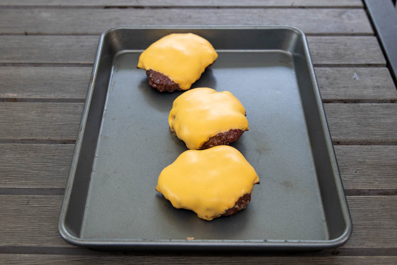 The Step-By-Step Grilling Method - Brioche Burgers On Charcoal - Cheddar And Beef Burgers On A Tray